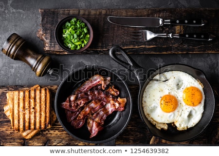 Stock photo: Crispy Fried Bacon On A Slice Of Bread