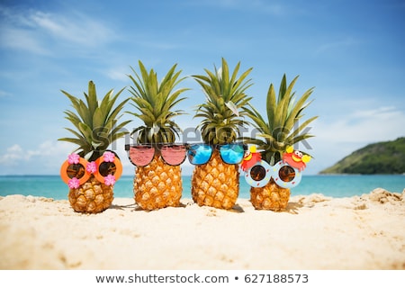 Stockfoto: A Pineapple Boy And Pineapples On Vacation