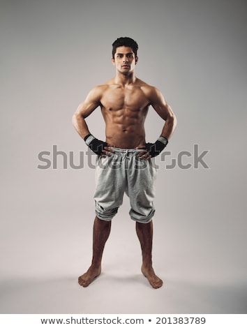 Stockfoto: Macho Man Posing Shirtless