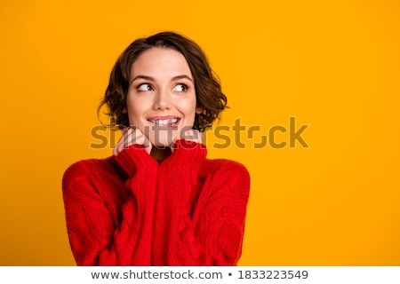 Stok fotoğraf: Woman With Red Lips And Brown Hair Looking Thoughtful