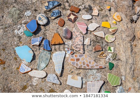 Foto d'archivio: Pieces Of Colorful Tiles Polished By The Sea