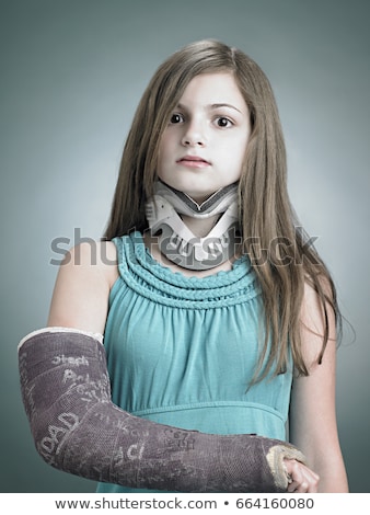 Foto stock: Girl With Neck Brace And Arm In Plaster