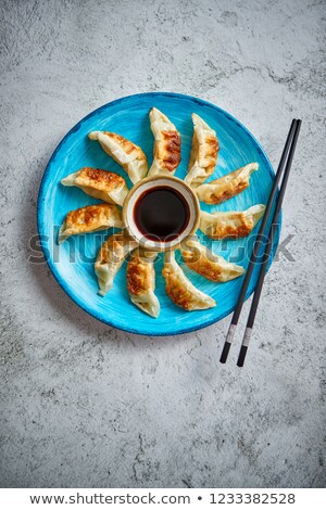 ストックフォト: Traditional Asian Dumplings Gyozas On Turqoise Ceramic Plate