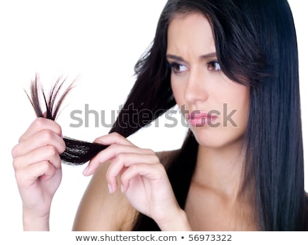 Сток-фото: Image Of Disappointed Woman 20s With Beautiful Long Hair Looking