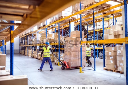 Foto stock: People Are Working At Warehouse