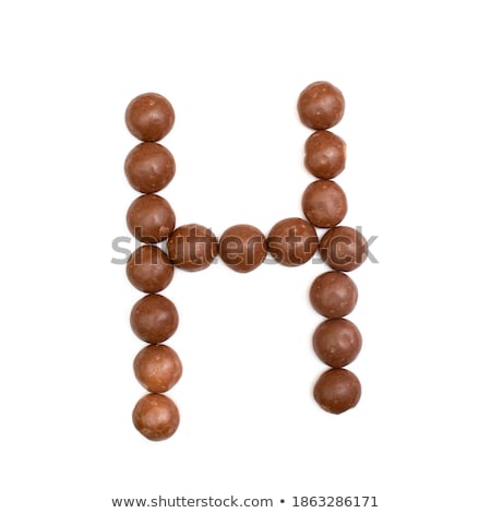 Foto stock: Ginger Nuts Pepernoten In The Shape Of Letter H