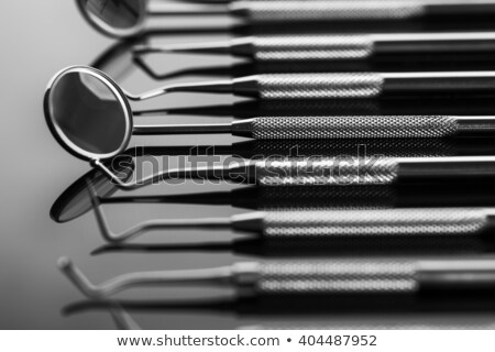 Foto d'archivio: Closeup Of Professional Dental Tools On Shiny Table