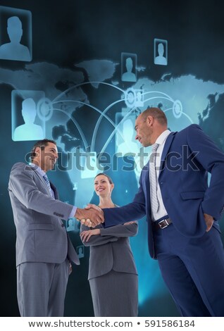 Stockfoto: Digital Generated Human Hand And Businessman Shaking Hands