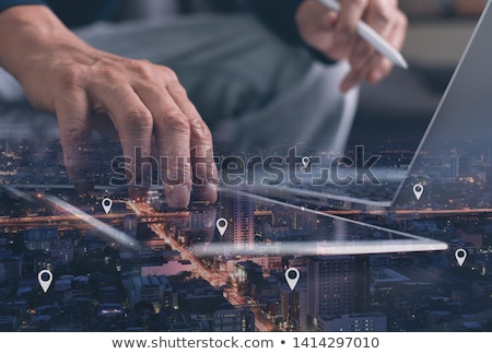 Stockfoto: Man Using Gps Map On Laptop