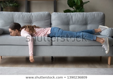 Сток-фото: Lazy Woman Sleeping On Couch