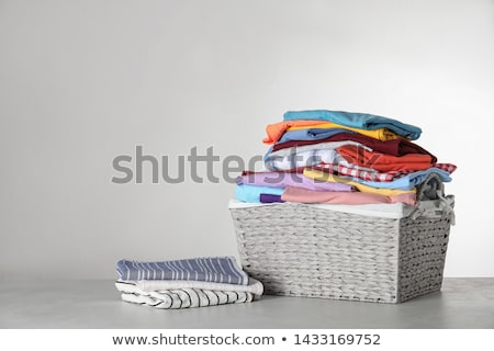 Zdjęcia stock: Laundry Basket With Folded Clothes