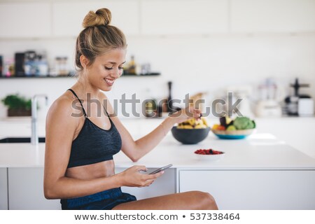 Сток-фото: Happy Woman In Underwear Sending A Text
