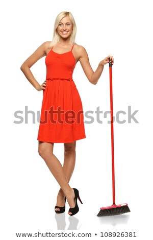 Foto d'archivio: Young Woman With Broom Isolated On White