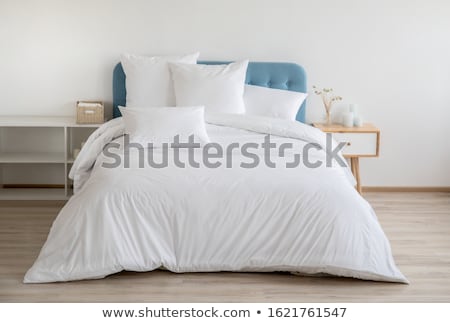 Foto stock: White Bedding Sheet And Pillow