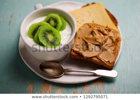 Stock foto: Natural Yoghurt With Kiwi And Peanut Butter Toast Healthy Breakfast