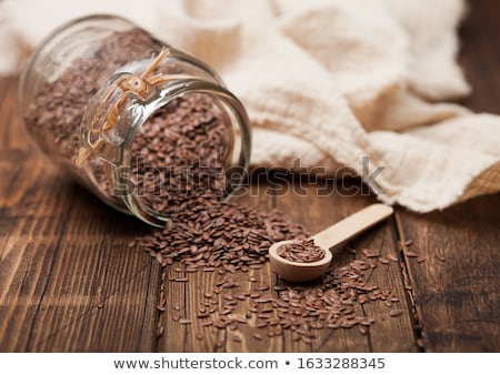 Stock fotó: Glass Jar Of Raw Natural Organic Linseed Flax Seed With Spoon And Linen Cloth On Wooden Background