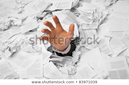 Zdjęcia stock: Hand Buried In Document Pile