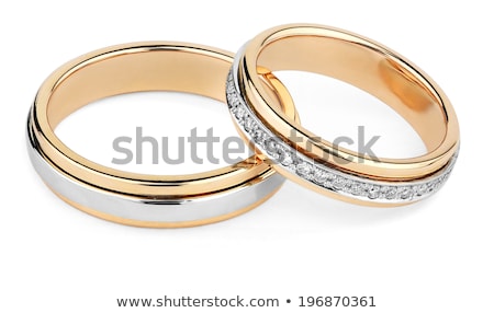 Stock foto: Pair Of Wedding Rings In A Heart Shaped Box