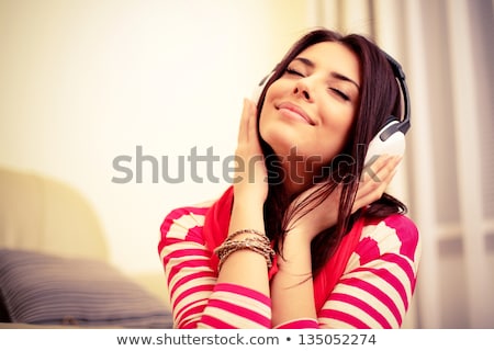 [[stock_photo]]: Closeup Portrait Of Pretty Young Girl Listening Music