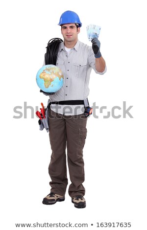 Сток-фото: Electrician Holding Globe And Cash