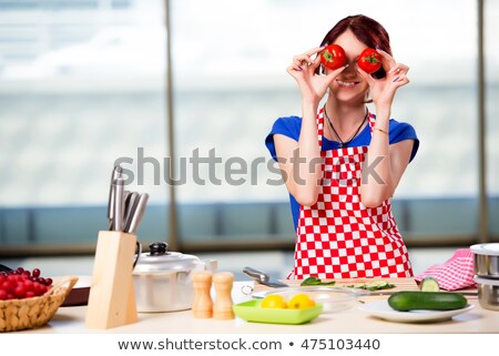 Funny Woman Cutting Cucumber Stock photo © Elnur