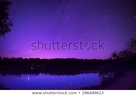 Foto stock: Beautiful Night Sky With Many Stars On A Lake