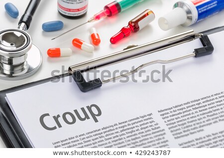 Stok fotoğraf: The Diagnosis Croup Written On A Clipboard