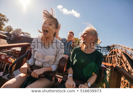 Stockfoto: Moving Roller Coaster