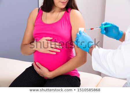 Stock photo: Woman Injecting Stomach