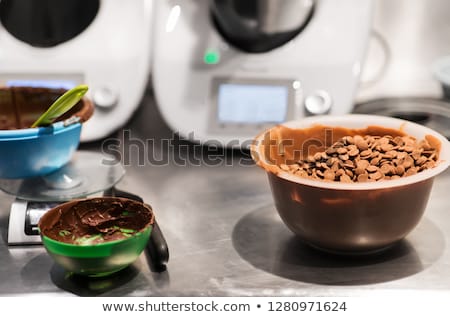 Foto stock: Chocolate Buttons In Bowl At Confectionery Shop