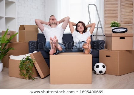 ストックフォト: Man Surrounded By Boxes