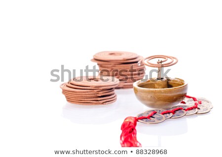 Foto stock: Incense Coil Burning With Old Chinese Coins