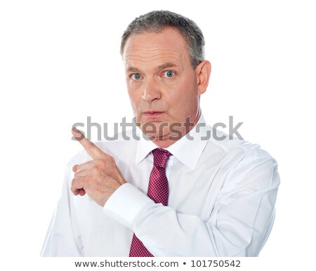 ストックフォト: Portrait Of Senior Businessman Pointing Backwards
