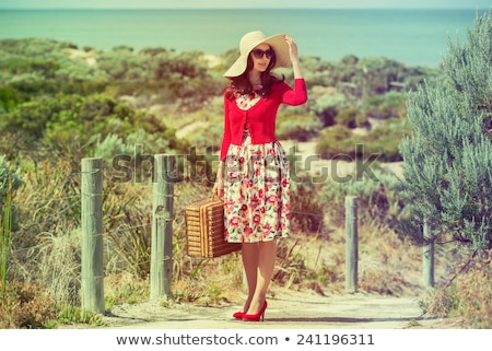 Foto stock: Beautiful Young Woman With Umbrella At Sea