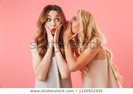 Stock fotó: Two Girls Whispering