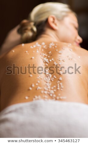 Foto stock: Close Up Of Woman Having Salt Massage In Spa