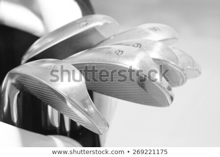 Сток-фото: Chrome And Black Golf Club Wedge Irons On White Background