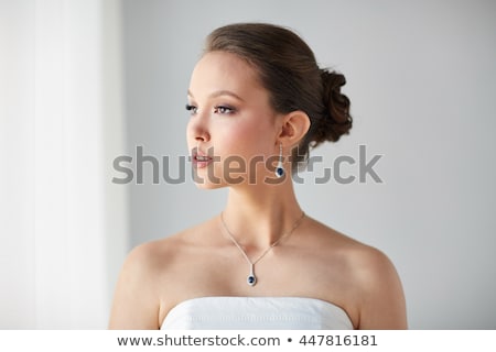 Stockfoto: Beautiful Asian Woman With Earring And Pendant
