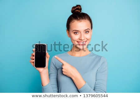 Stok fotoğraf: Charming Young Woman Holding Out Her Hand