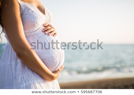 Сток-фото: Pregnant Woman On The Beach