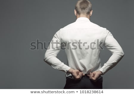 Stock photo: Man Undressing Over White