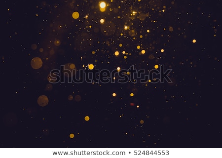 Foto d'archivio: Gold Star On Dark Background