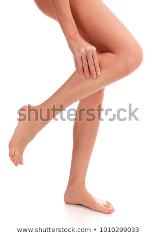 商業照片: Pain In A Leg Woman Holding Sore Shin White Background