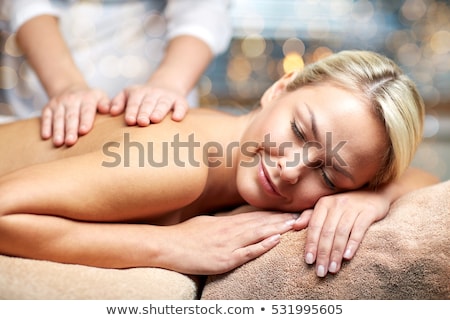 Foto stock: Close Up Of Woman Having Back Massage At Spa