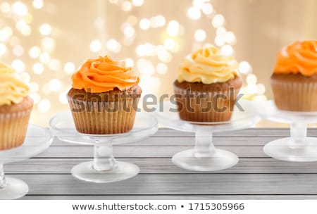 Zdjęcia stock: Cupcakes With Frosting On Confectionery Stands