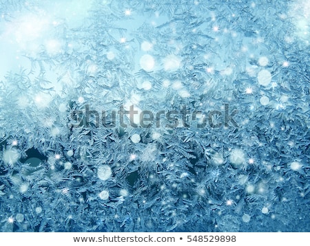 Stockfoto: Ice Pattern And Sunlight On Winter Glass