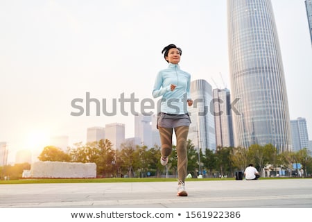 Stock fotó: Women Jogging In City In Dusk