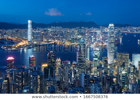 [[stock_photo]]: Ong · Kong · la · nuit · avec · des · immeubles · de · grande · hauteur