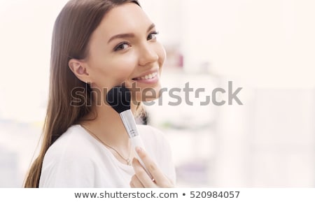 [[stock_photo]]: Beauty Girl With Makeup Brushes Natural Make Up For Brunette Wo