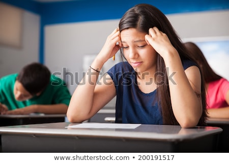 Stockfoto: Stressed Female Teenager Worried About Exams